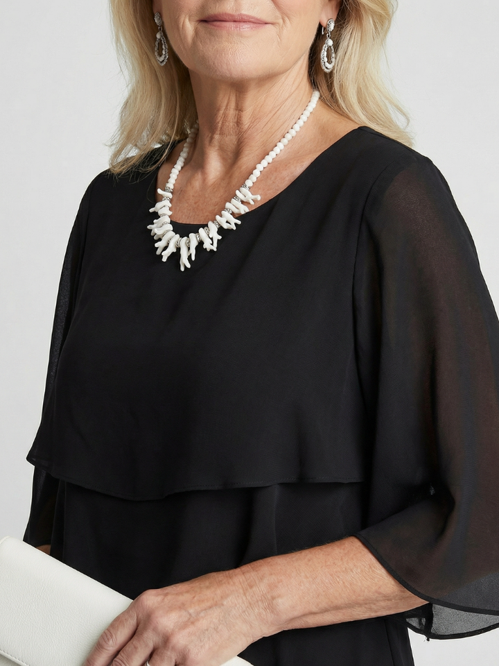 Versatile layered midi dress for women, elegant and casual, ideal for spring fashion.