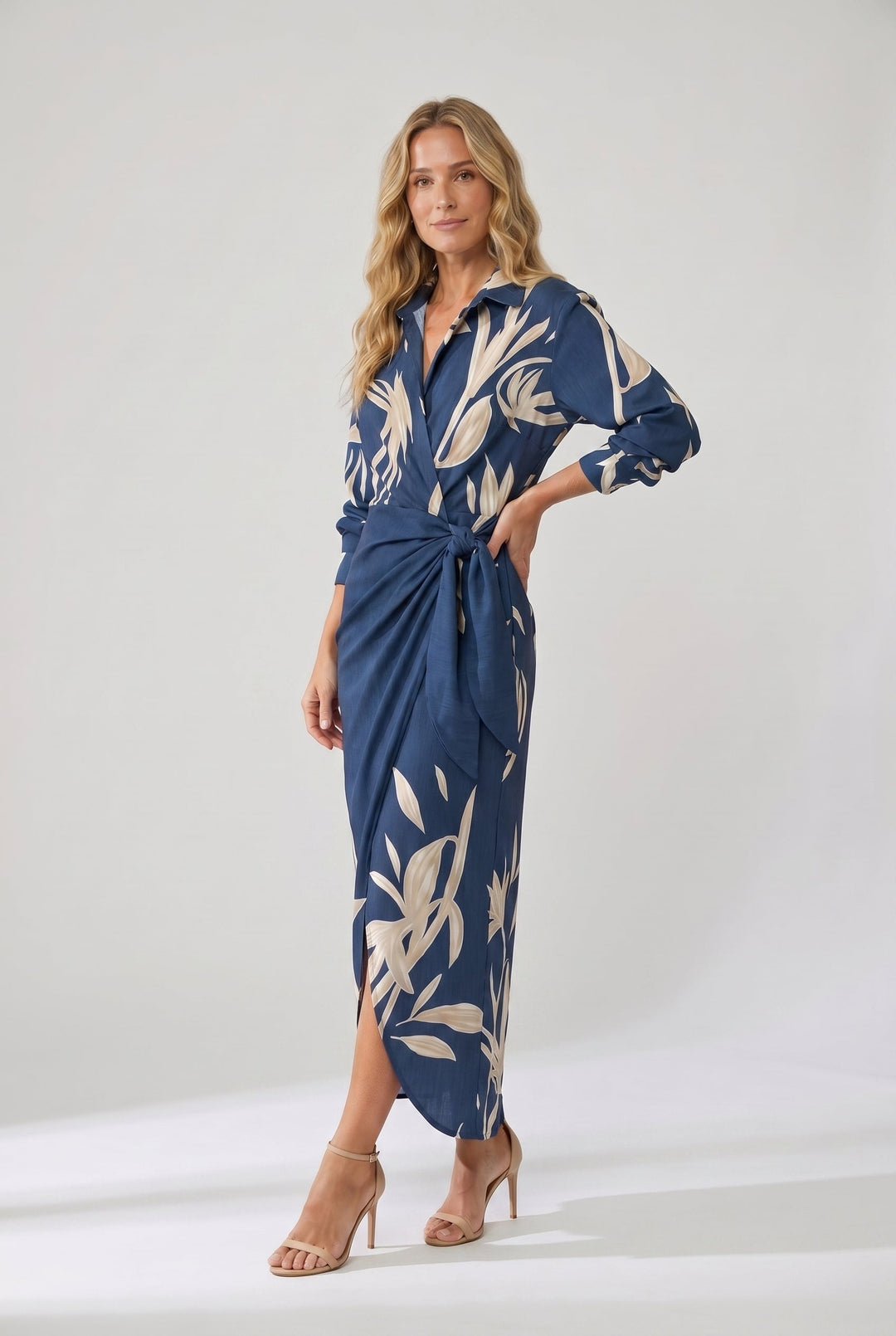 Plus size women's leaf print maxi wrap dress, flattering V-neck, ideal for summer fashion.