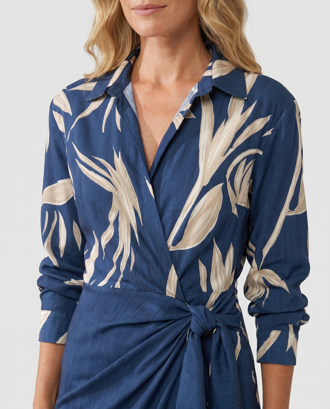 Casual women's leaf print maxi dress with a chic wrap design and deep V-neck.