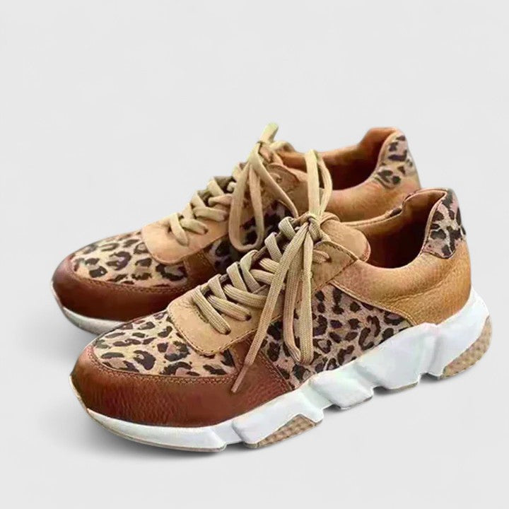 Trendy women's leopard print fashion sneakers. Elegant, comfortable walking shoes with excellent arch support.