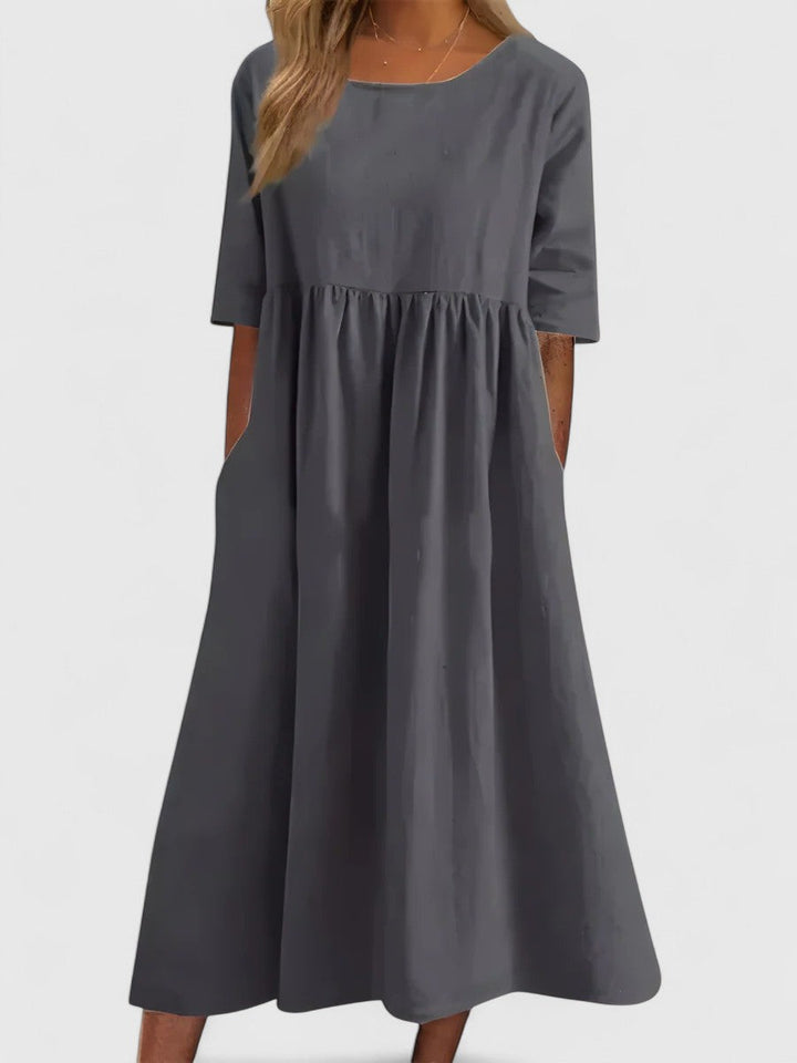 Flowy, comfortable women's everyday maxi dress with pockets. Versatile for summer.