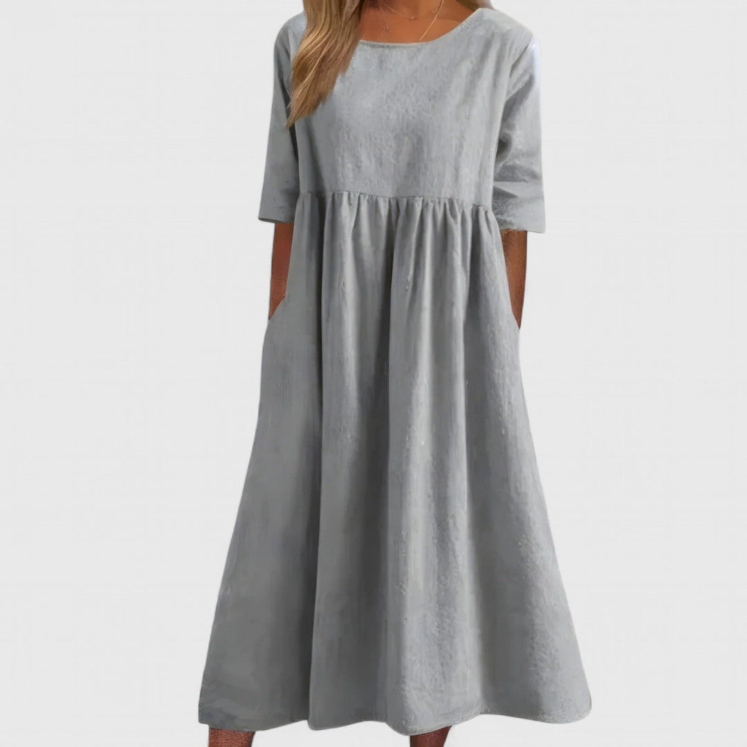 Everyday women's maxi dress: elegant, lightweight, comfortable with a round neck and pockets.