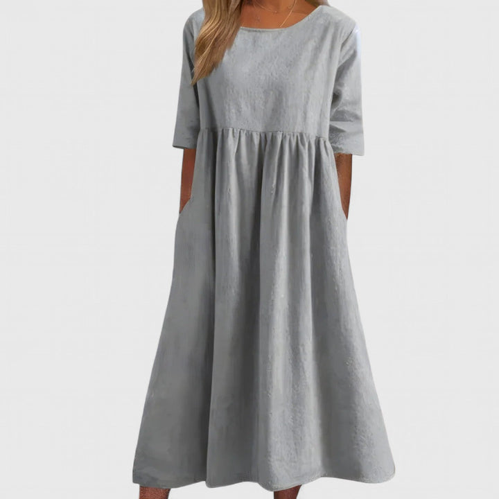 Everyday women's maxi dress: elegant, lightweight, comfortable with a round neck and pockets.