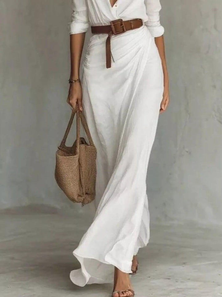 Make a statement with this elegant women's long sleeve belted maxi dress, versatile for any setting.