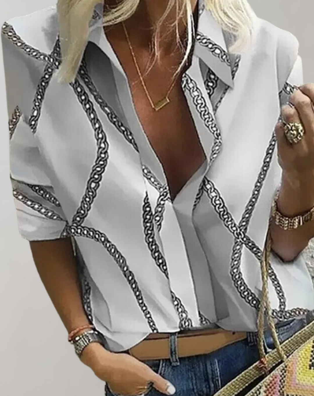 Chic fashion: a versatile women's blouse with a sophisticated chain pattern