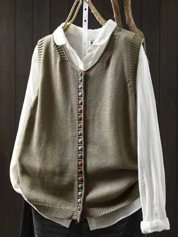 Fashionable women's long sleeve knit cardigan. Elegant layering piece for versatile everyday outfits.