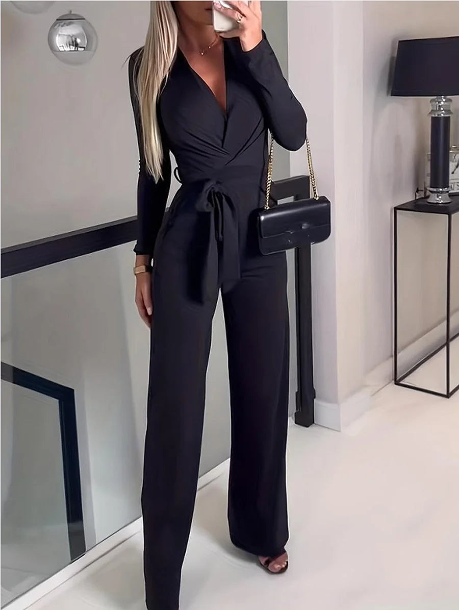 Comfortable women's long-sleeve V-neck wide-leg jumpsuit with tie waist, a fashionable and versatile outfit.