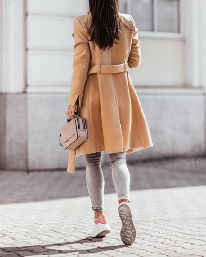 Classic women's longline double-breasted trench coat with tie waist, sophisticated elegant winter outerwear.