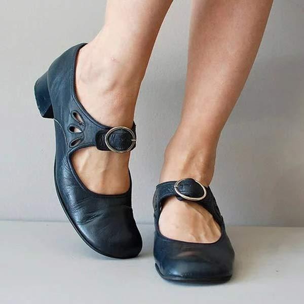Women's elegant low heel leather slip-on shoes for timeless style and comfort.
