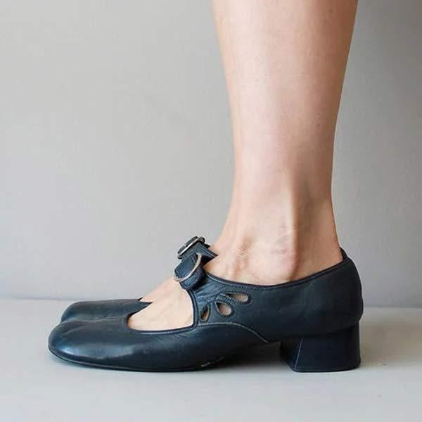 Elegant women's footwear: low heel, premium leather slip-on shoes for sophisticated everyday wear.