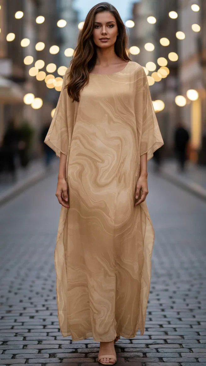 Women's elegant marbled kaftan maxi dress with batwing sleeves, perfect for evening wear.