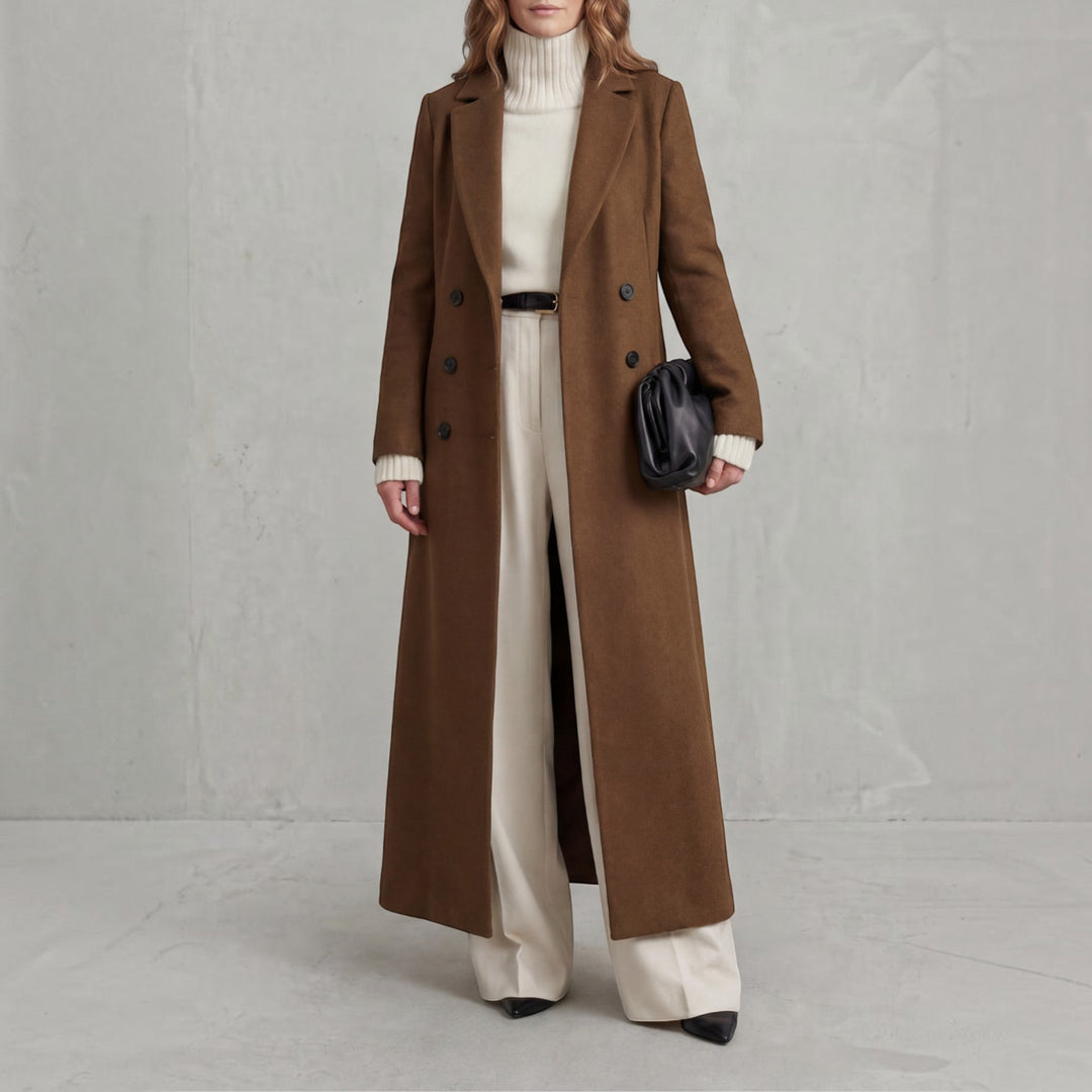Sophisticated women's double-breasted winter trench coat, elegant maxi length, timeless fashion.