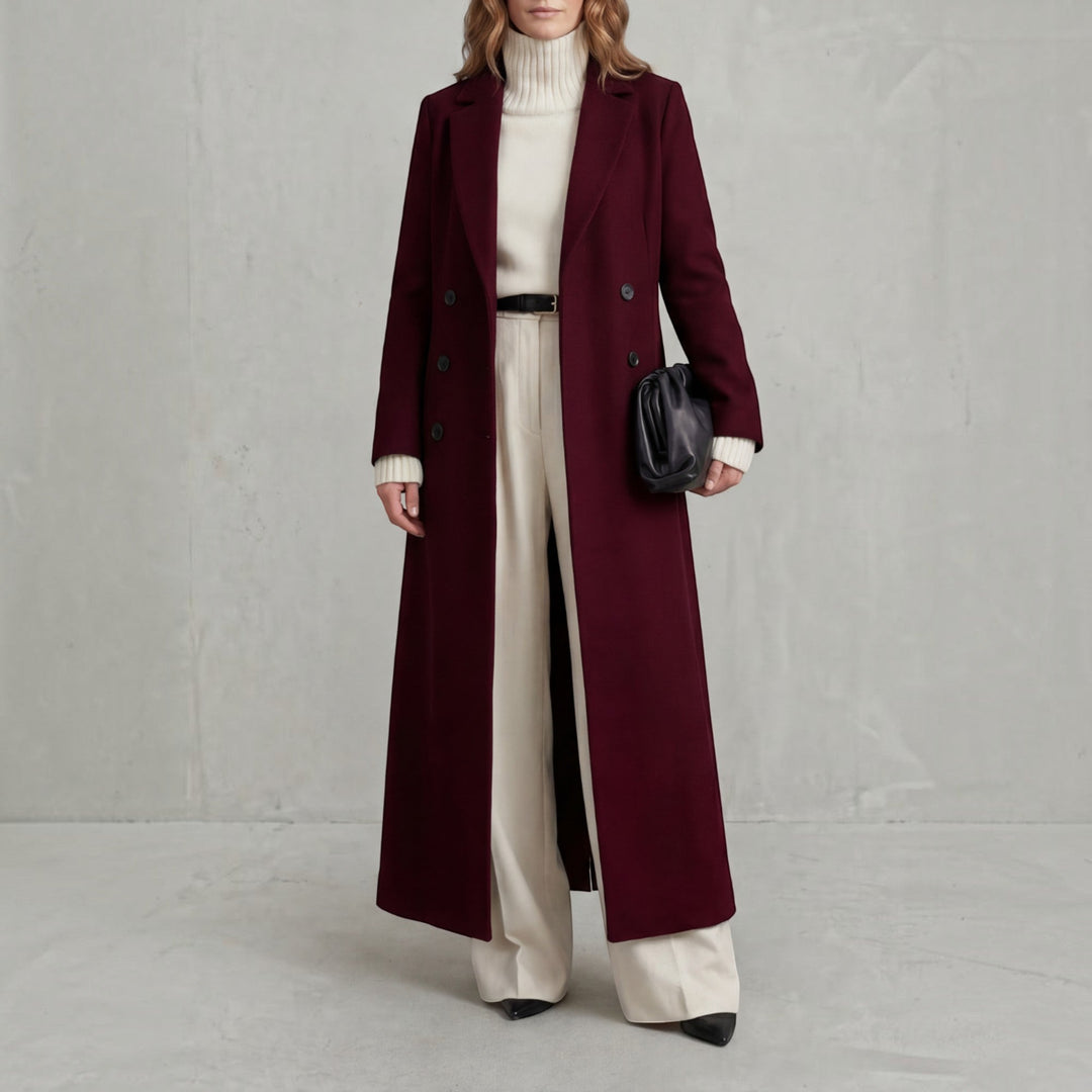 Elegant women's long winter trench coat, double-breasted maxi design, chic and fashionable outerwear.