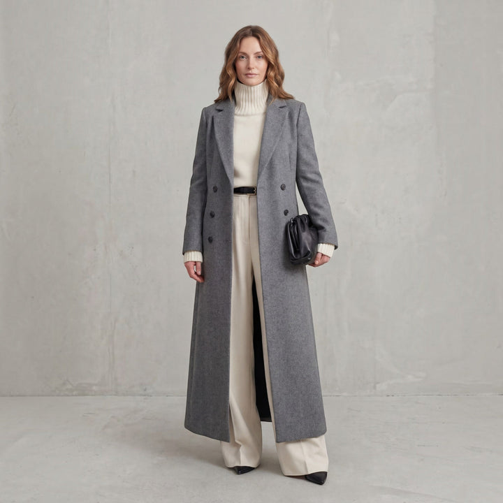 Warm women's winter trench coat, long double-breasted design, elegant and fashionable outerwear.