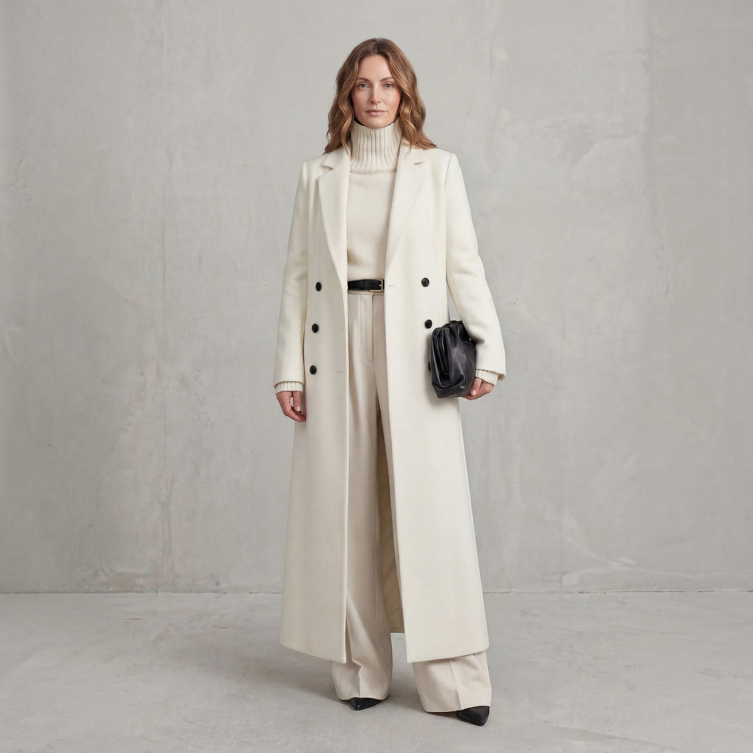 Chic women's elegant winter trench coat, double-breasted maxi length for a sophisticated style.