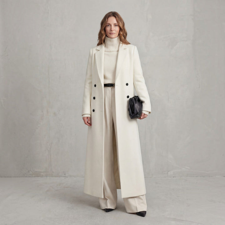 Chic women's elegant winter trench coat, double-breasted maxi length for a sophisticated style.