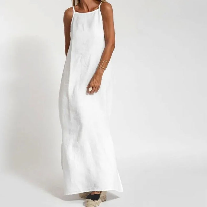 Flowy women's elegant maxi slip dress with chic slits, offering a comfortable and stylish look for any occasion.