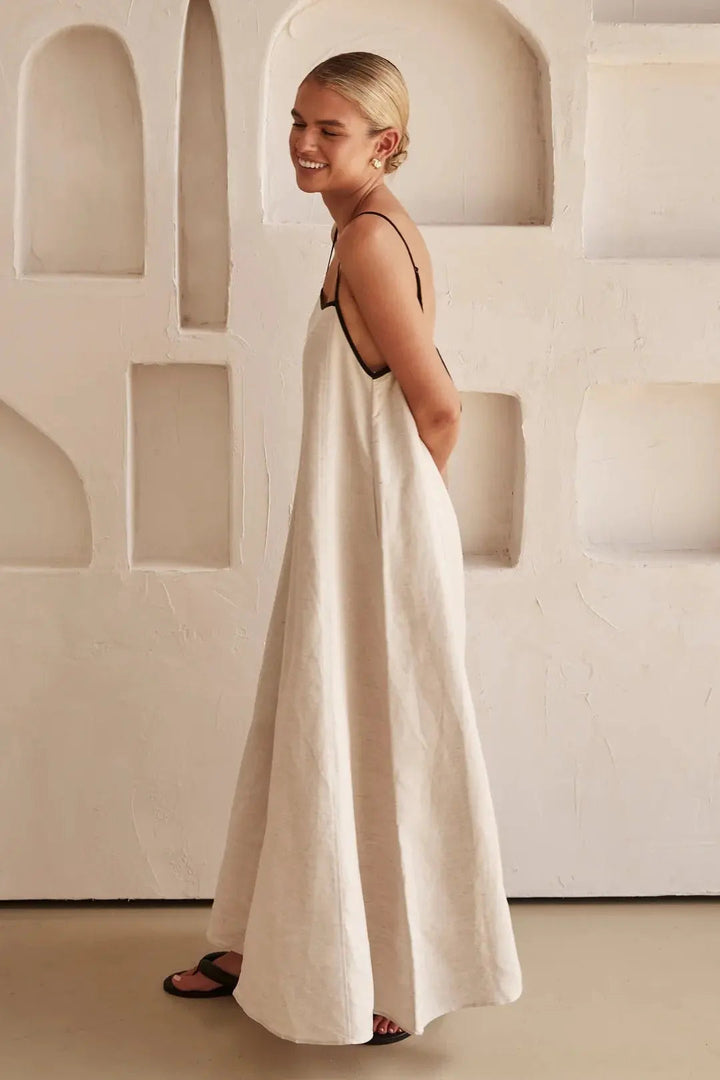 Versatile casual women's maxi dress with elegant contrast trim, adjustable straps, and a flowy silhouette for summer.
