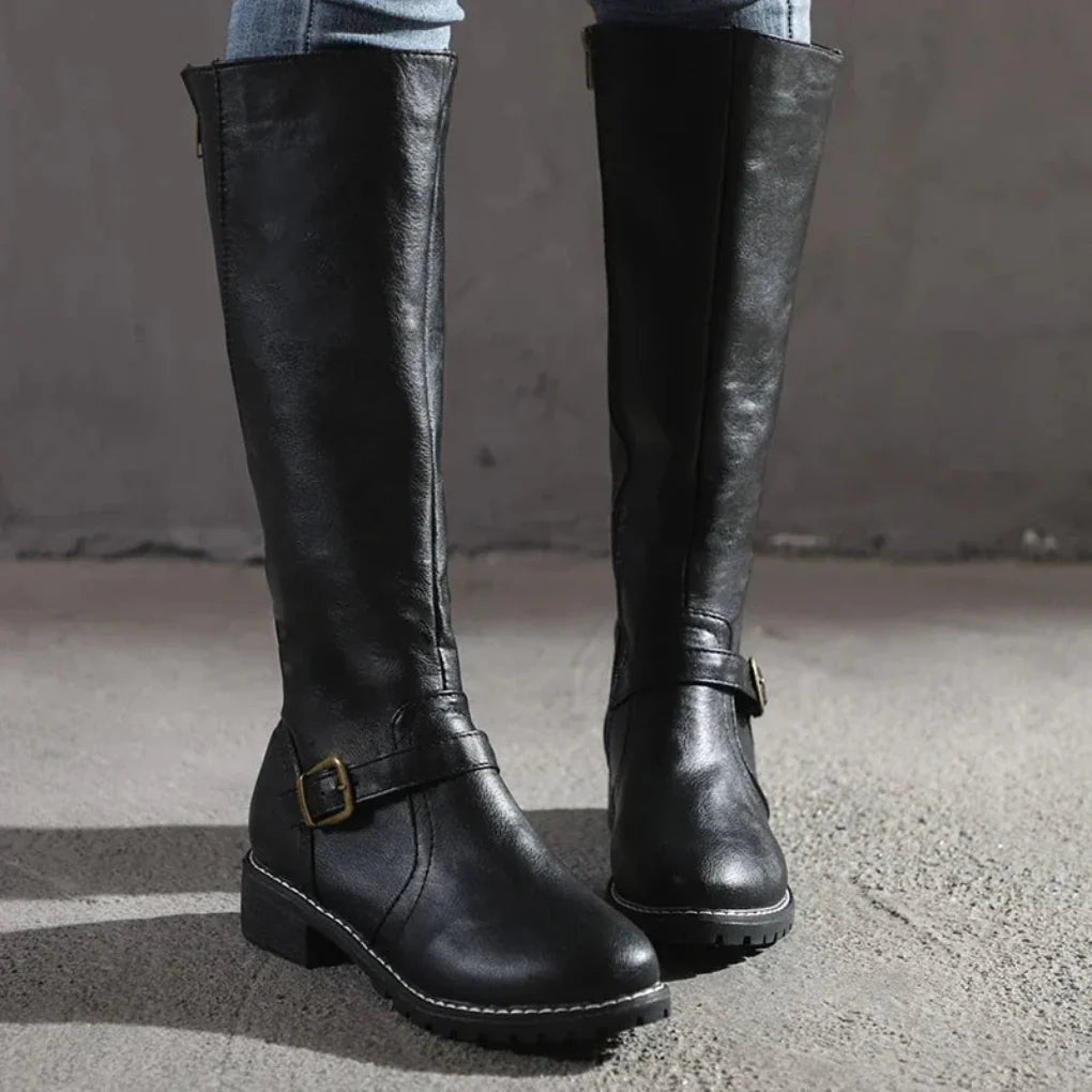 Versatile women's heeled boots, ideal for dressing up or for comfortable winter wear.