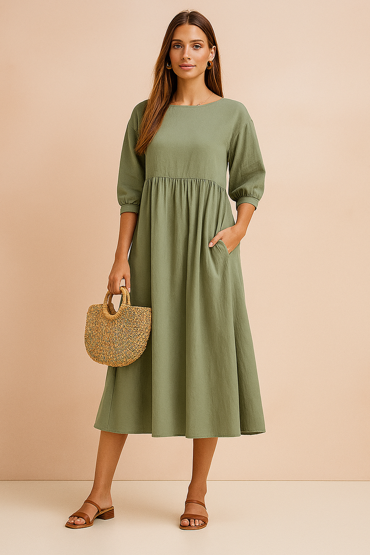 Women's elegant midi dress with chic 3/4 sleeves, perfect for work or casual wear.