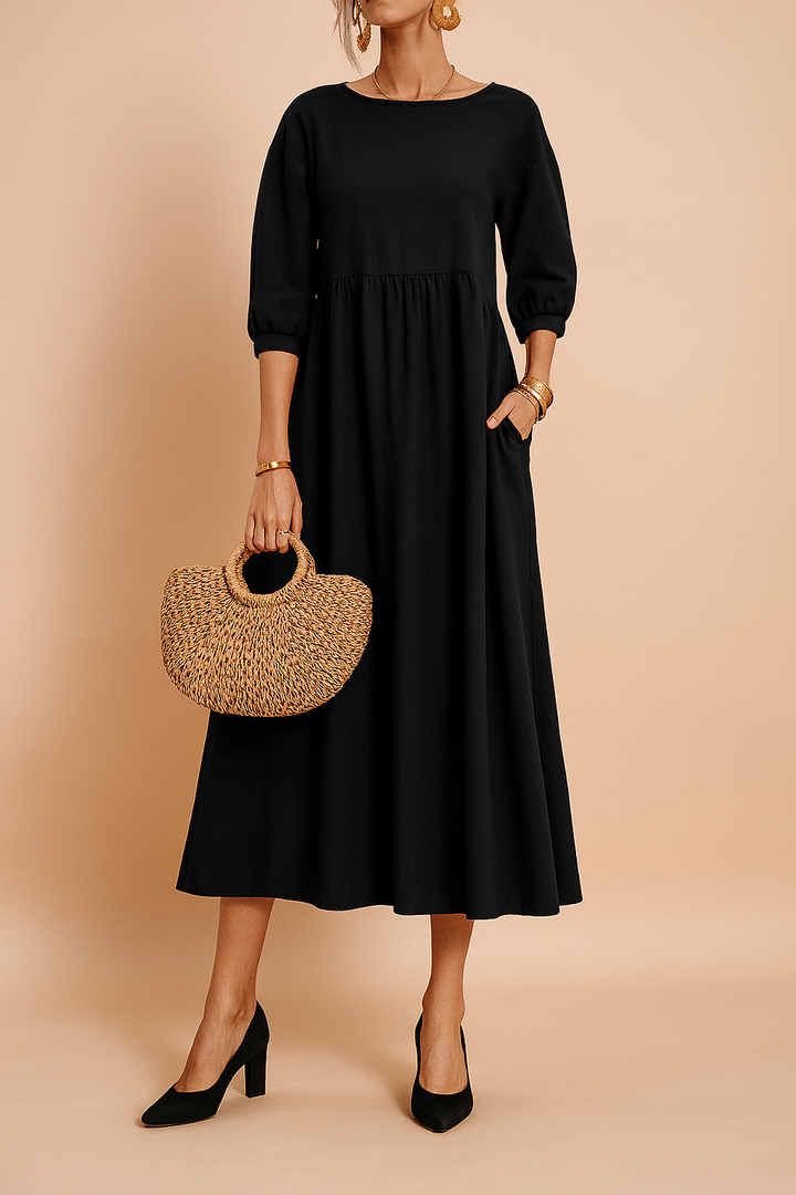Elegant midi dress for women with 3/4 sleeves, a versatile addition to your wardrobe.