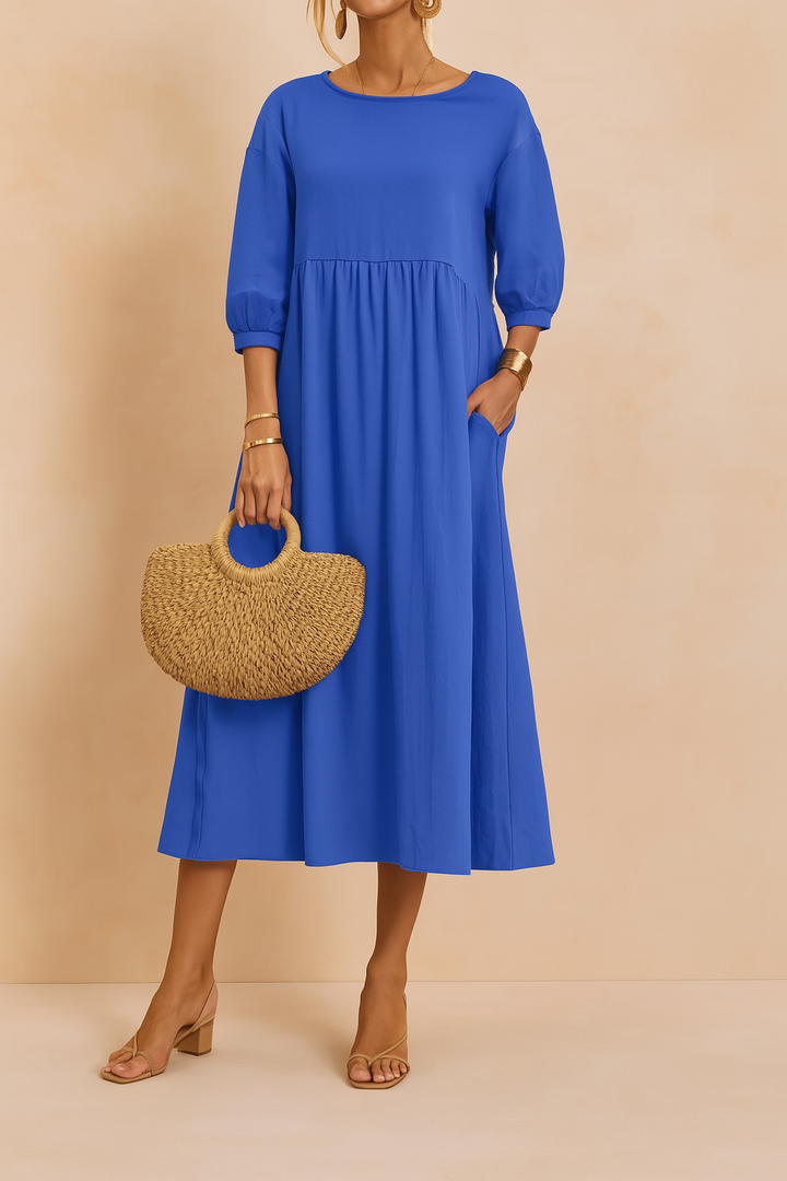 A sophisticated midi dress for women, showcasing 3/4 sleeves and elegant style.