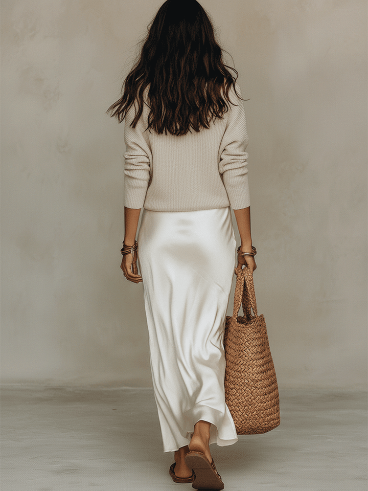 Versatile women's two-piece midi skirt co-ord set. Effortless day to night fashion for a chic, modern look.