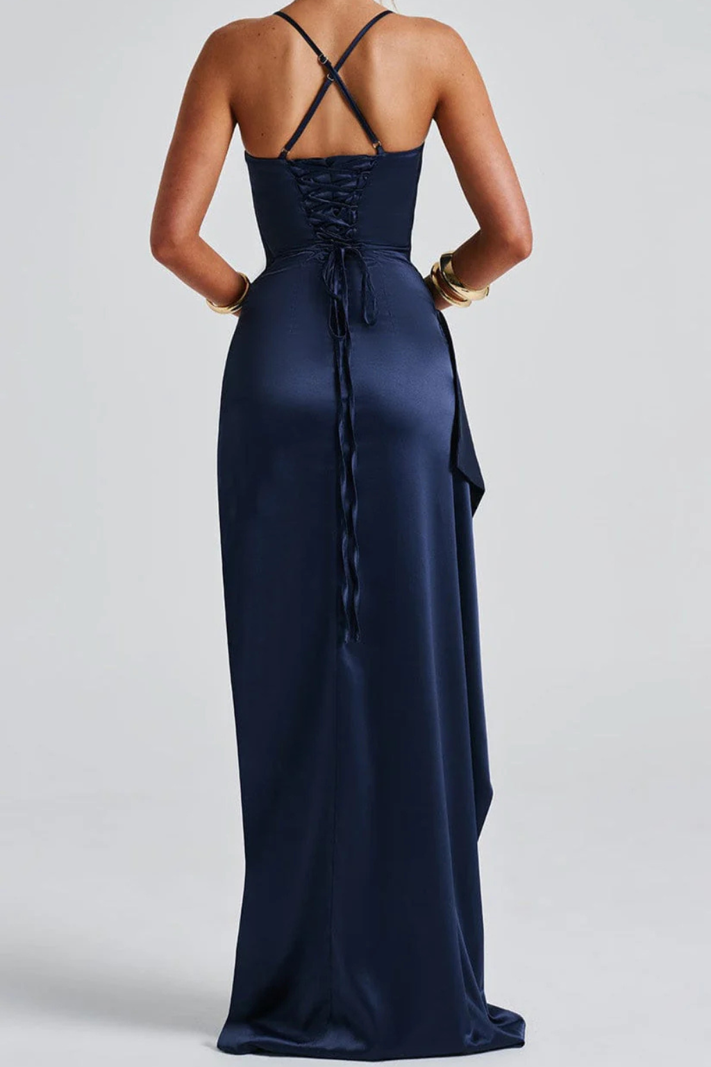 Women's navy blue high-slit ruched maxi wedding guest dress with spaghetti straps.