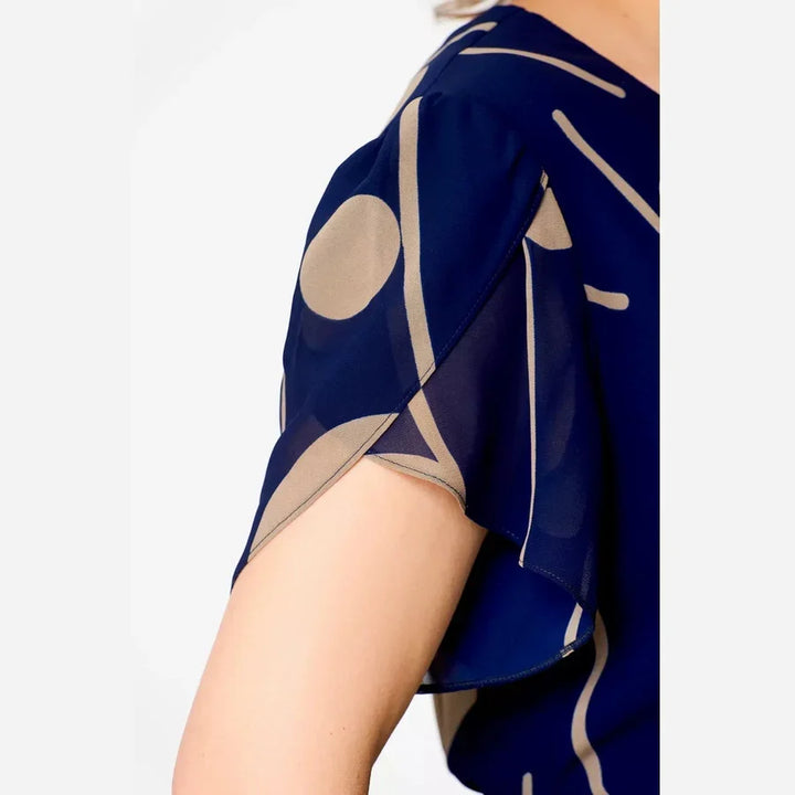 Stylish women's navy polka dot midi dress, perfect for effortless style, versatile for many occasions.