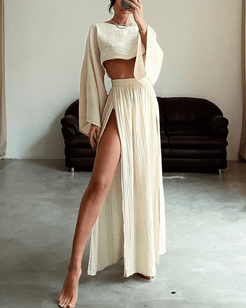Modern women's chic off-shoulder top and elegant maxi skirt two-piece set for a sophisticated, complete outfit.