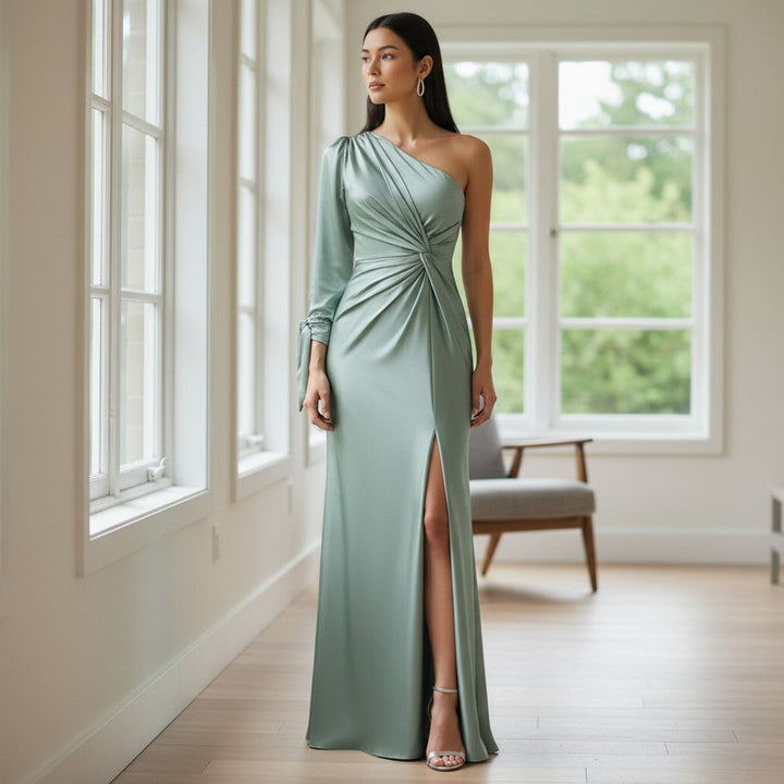 Long women's one-shoulder formal gown. Chic evening dress for weddings, prom, or gala. Elegant special occasion attire.