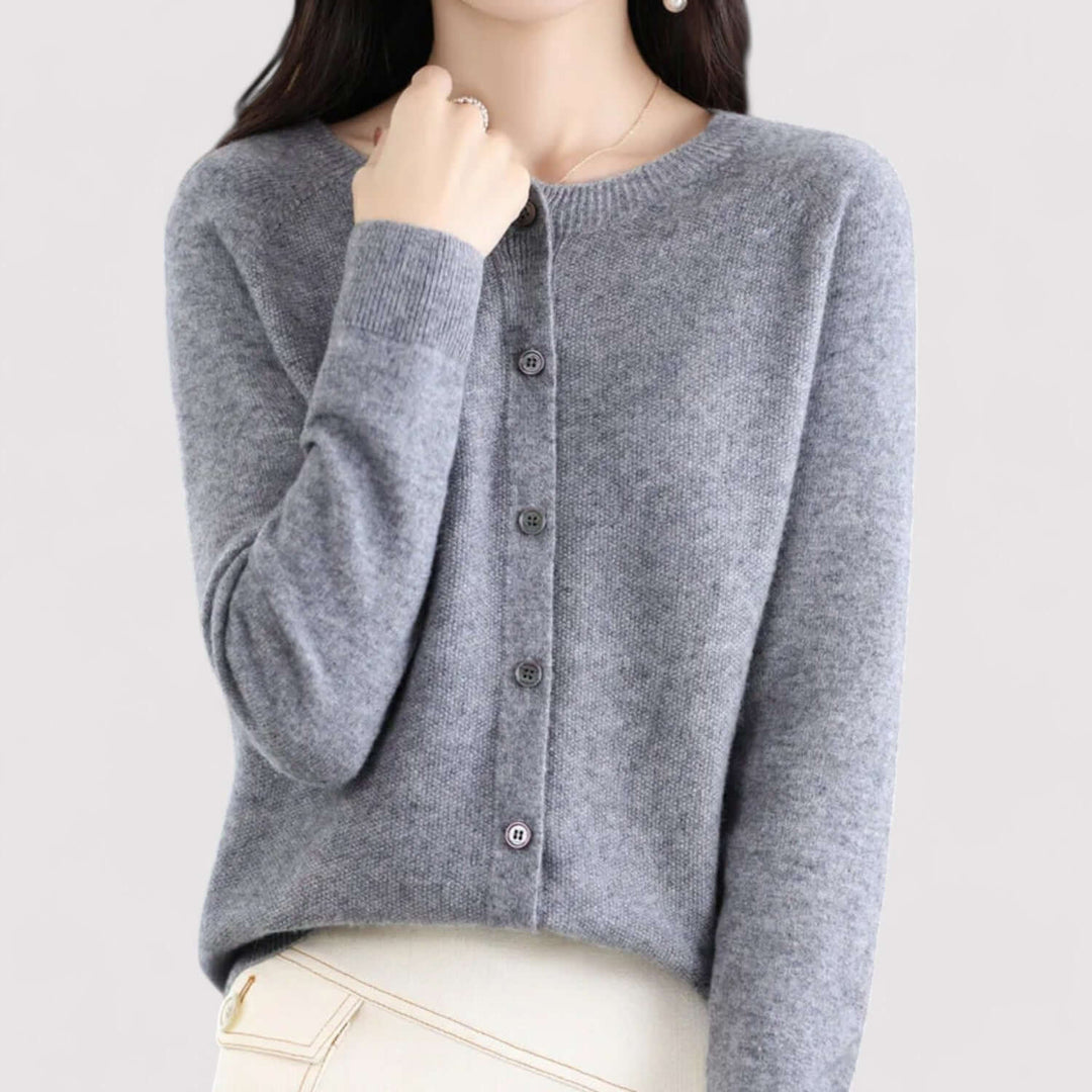 Sophisticated women's open-neck cardigan. Elegant long sleeve sweater for versatile layering and comfort.