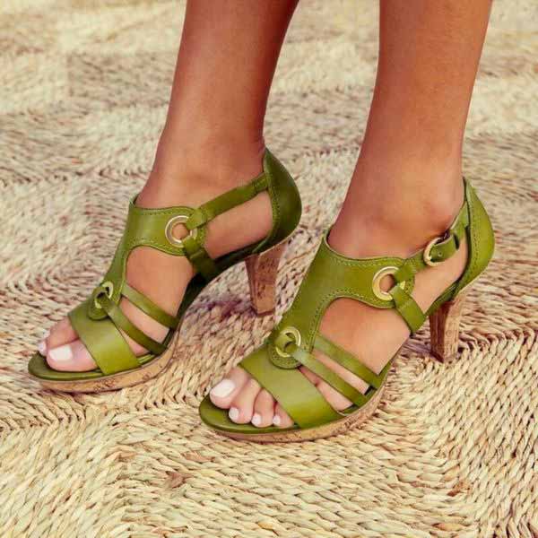 Elegant evening shoes with an open toe and sturdy chunky heel, designed for women.