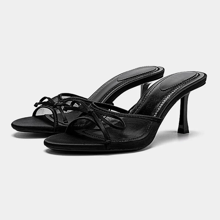 Women's elegant open toe kitten heel mule sandals. Chic slip-on fashion mules for versatile styling.