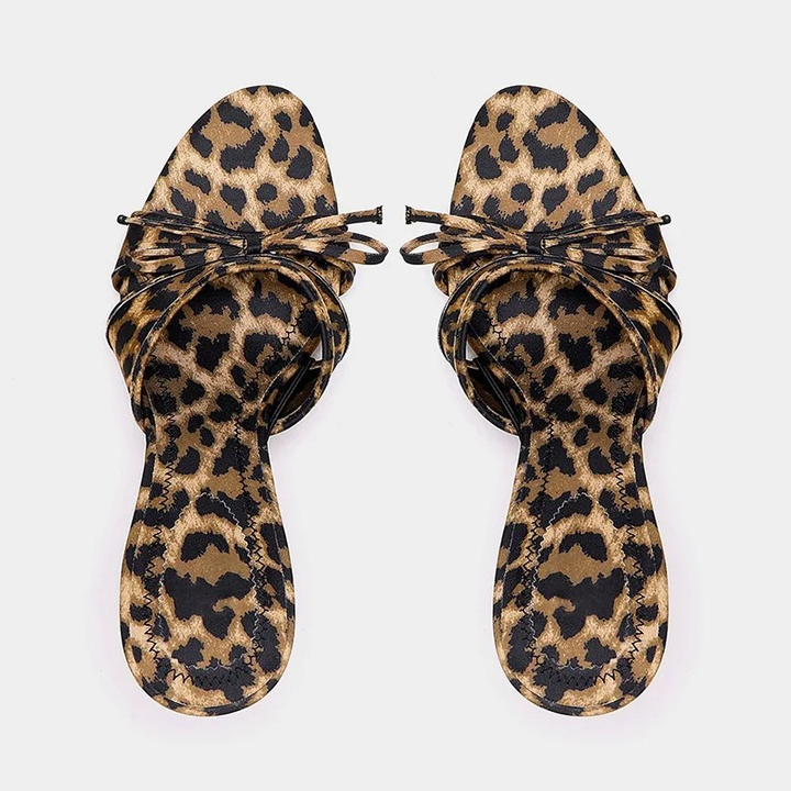 Front view of elegant women's open toe kitten heel mule sandals. A stylish and versatile slip-on shoe.