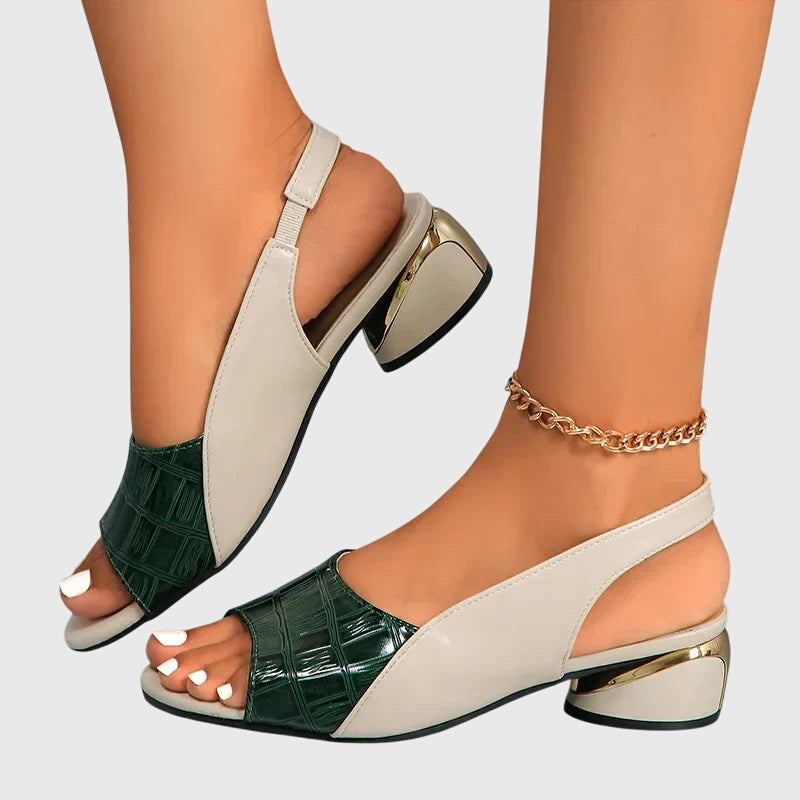 Women's open-toe block heel sandals featuring elegant design & metallic accents for versatile summer styling.