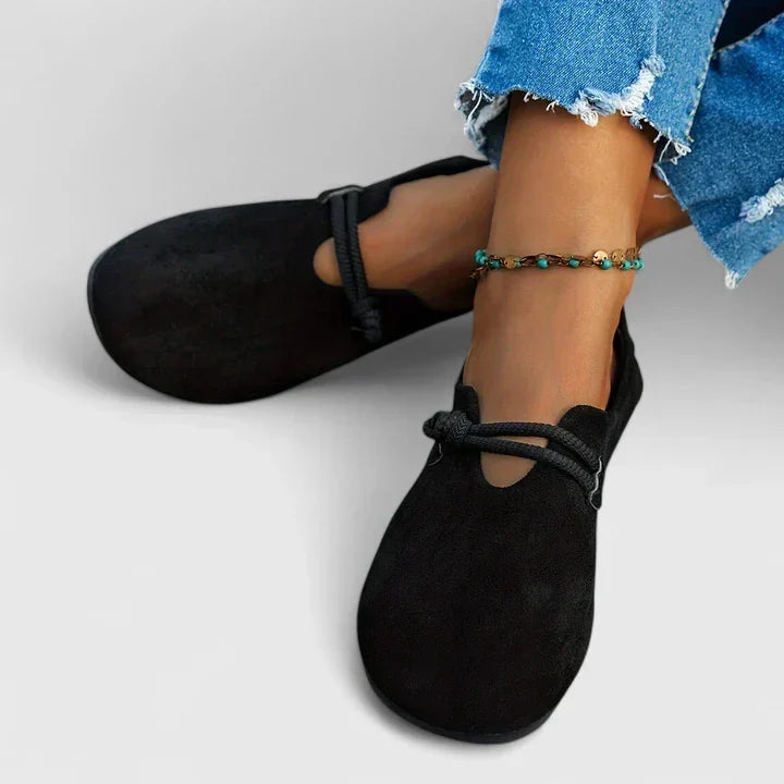 Comfortable women's orthopedic slip-on loafers offering arch support & all-day wear with a stylish lace design.