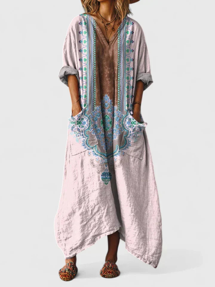 Flowy oversized women's dress with pockets, elegant yet casual, ideal for summer comfort.
