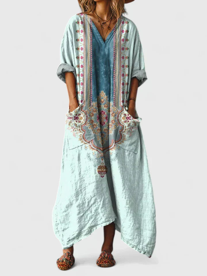 Women's elegant flowy dress with a relaxed oversized fit and functional pockets for comfort.