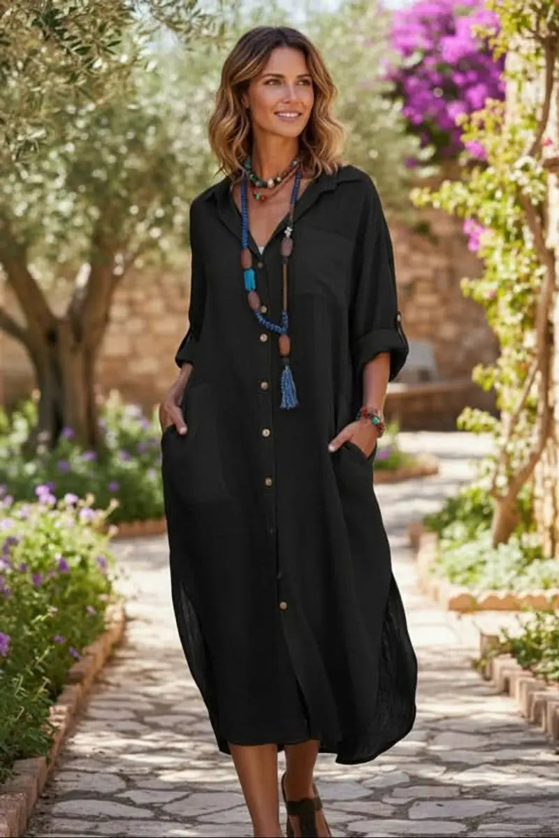 Relaxed fit women's oversized midi shirt dress. Effortless style, perfect for casual wear & summer.