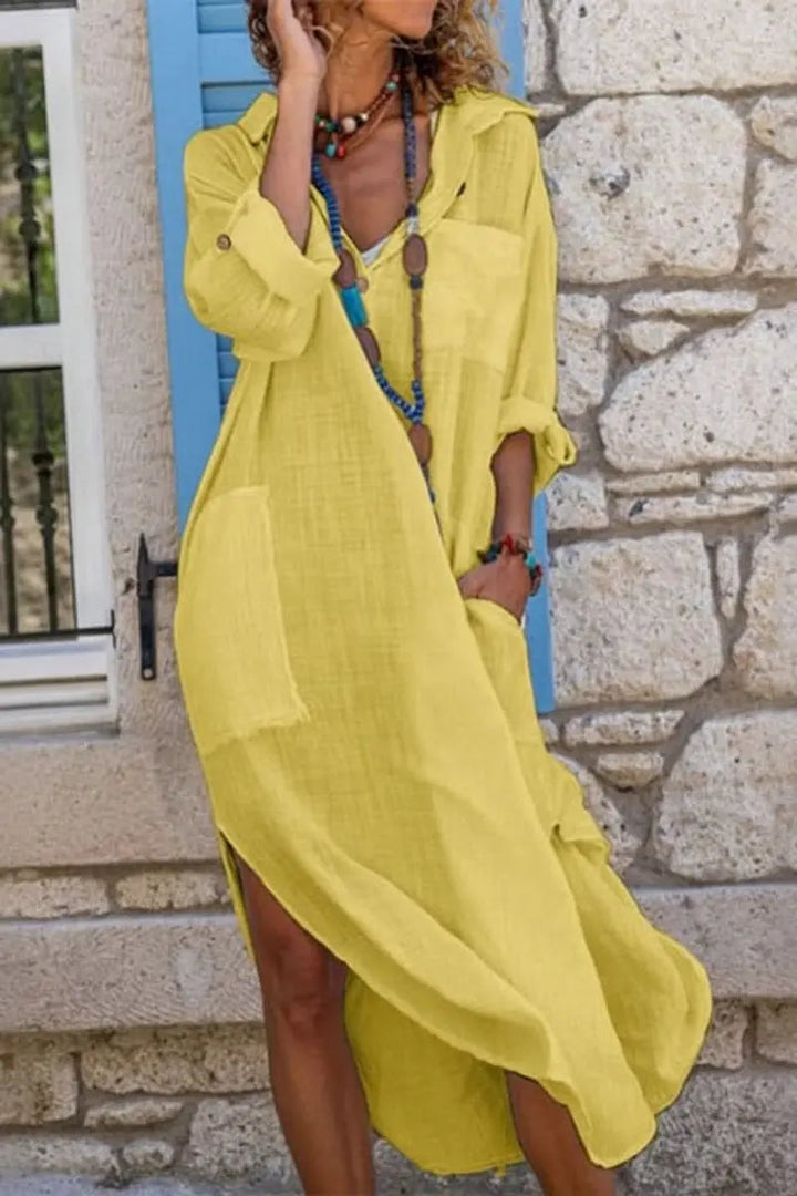 Women's V-neck oversized midi shirt dress. Elegant and comfortable, great for relaxed casual wear.