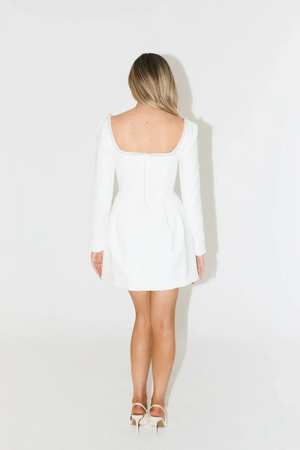 Elegant women's pearl trim long sleeve mini dress, perfect for cocktail parties, evening events & dinner.
