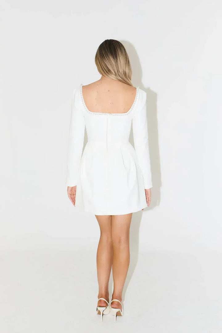 Elegant women's pearl trim long sleeve mini dress, perfect for cocktail parties, evening events & dinner.