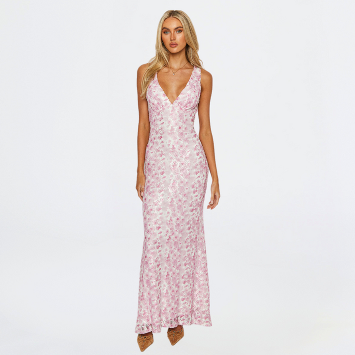 Women's elegant pink floral sleeveless wedding maxi dress for special occasions.