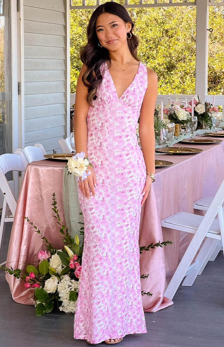 Feminine pink floral sleeveless maxi dress, elegant for weddings, parties, or special occasions.