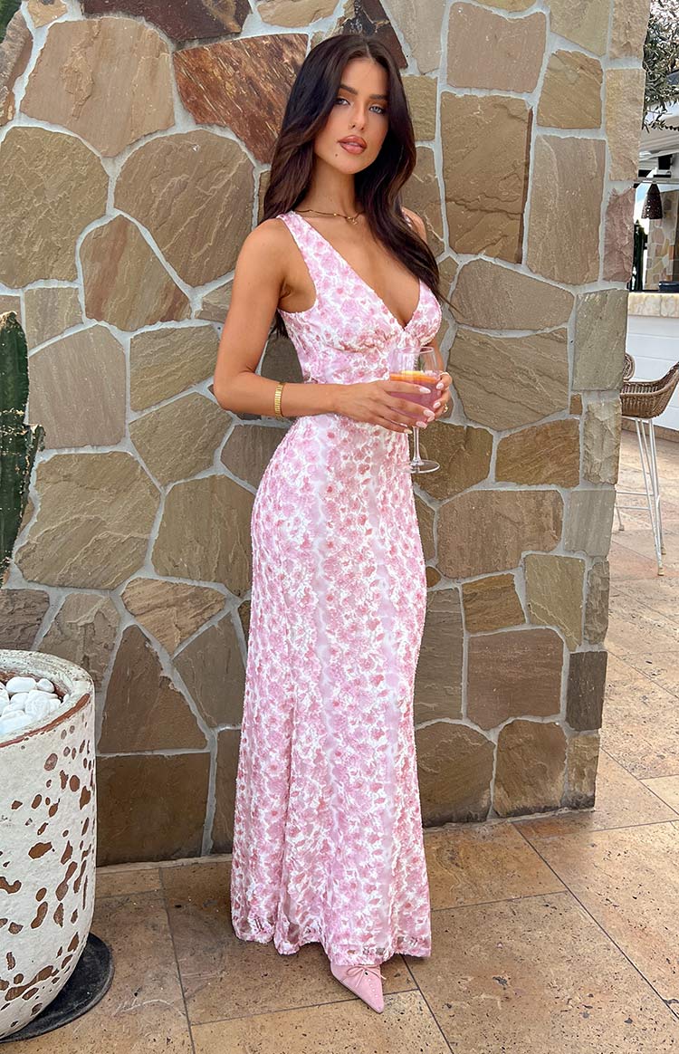 Unique pink floral sleeveless maxi dress, a perfect V-neck elegant outfit for celebrations.