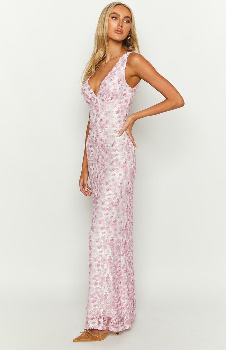 Beautiful pink floral sleeveless maxi party dress, comfortable for any elegant occasion.