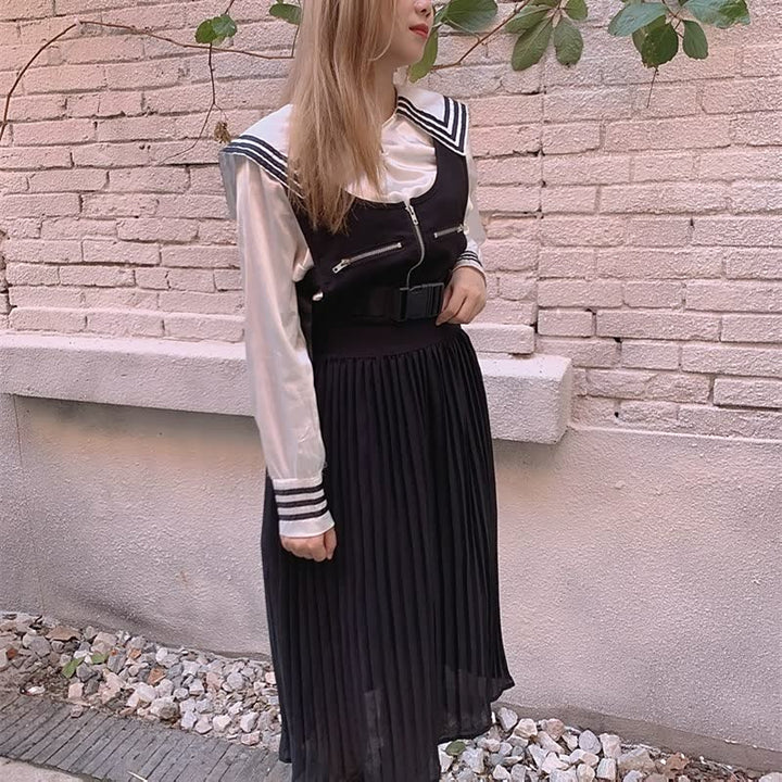 Women's elegant pink high waist pleated midi skirt, A-line silhouette for stylish everyday wear.