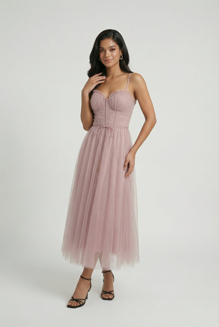 Women's elegant pink sleeveless midi dress, perfect for parties or casual wear.