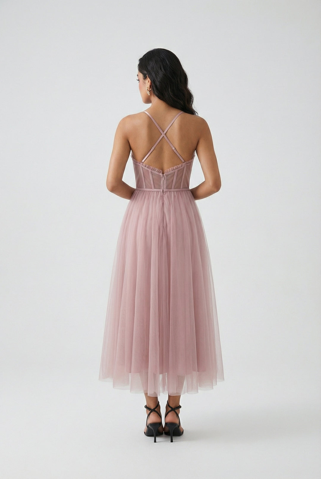 Chic sleeveless pink dress, a versatile midi length for stylish women's fashion.